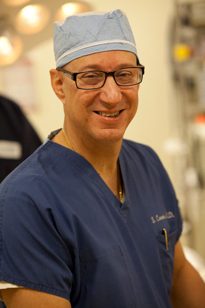 Dr. Stephen F. Coccaro posing in scrubs